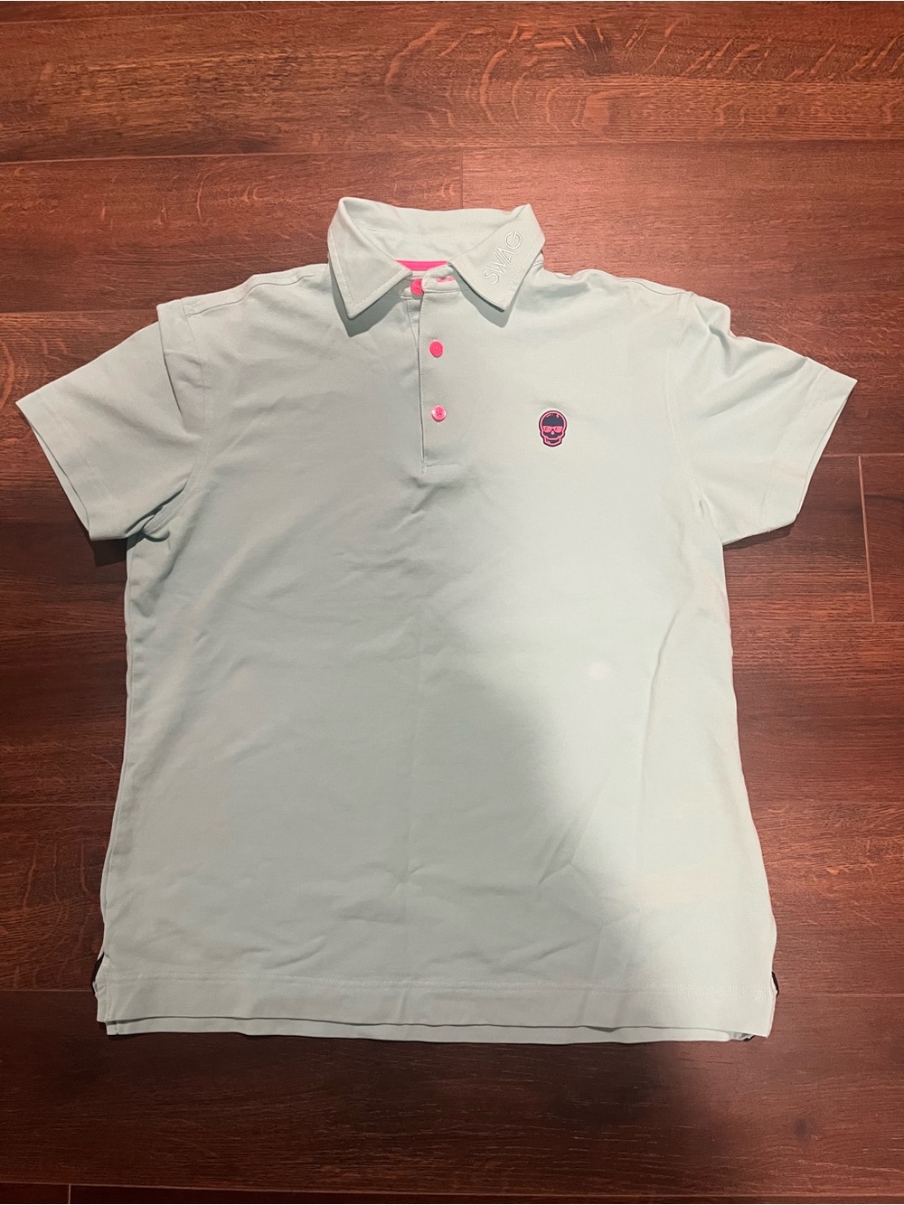 SWAG Golf Mint Green Short Sleeve Performance Polo Pink Skull Logo